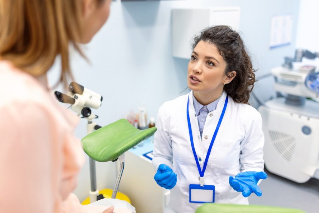 medical professional speaking to a patient